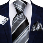 Men's striped tie in black and silver for formal occasions, how to tie mens tie