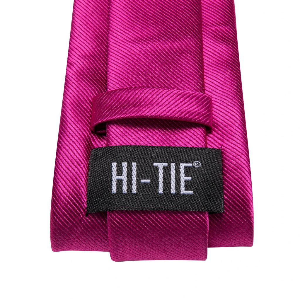 Pink silk necktie with label, perfect for learning necktie how to tie