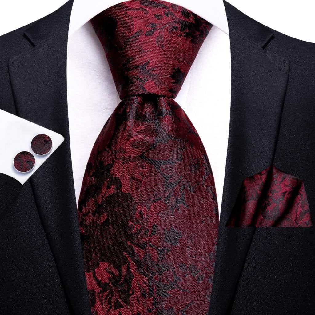 Elegant striped silk necktie in rich burgundy paired with matching pocket square and cufflinks