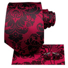 Elegant red and black striped silk necktie with matching cufflinks for stylish men