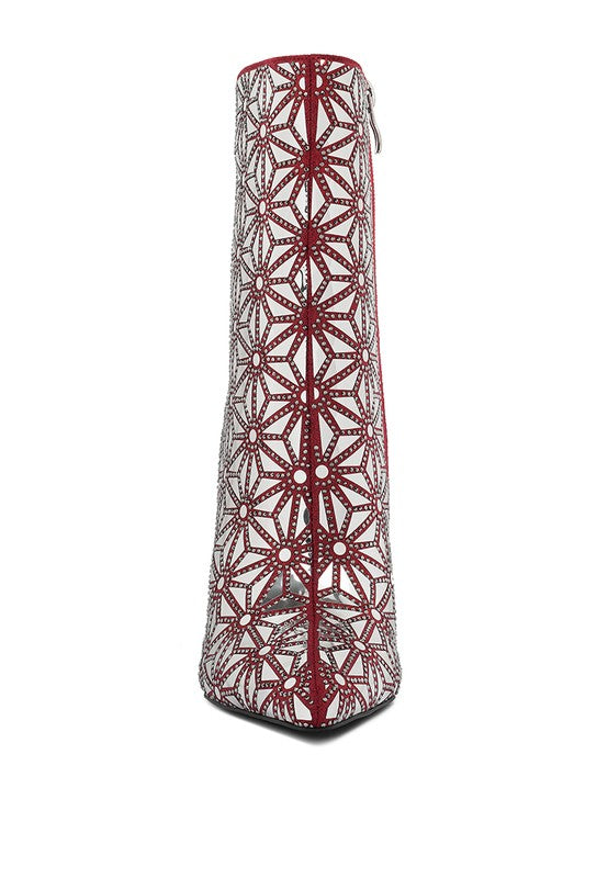 Elegant red high ankle designer boots for women featuring intricate lace-like cutouts and a sleek silhouette