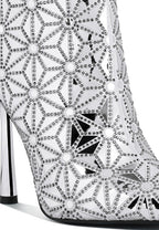 Stylish high ankle designer boots for women featuring a floral pattern and high heels