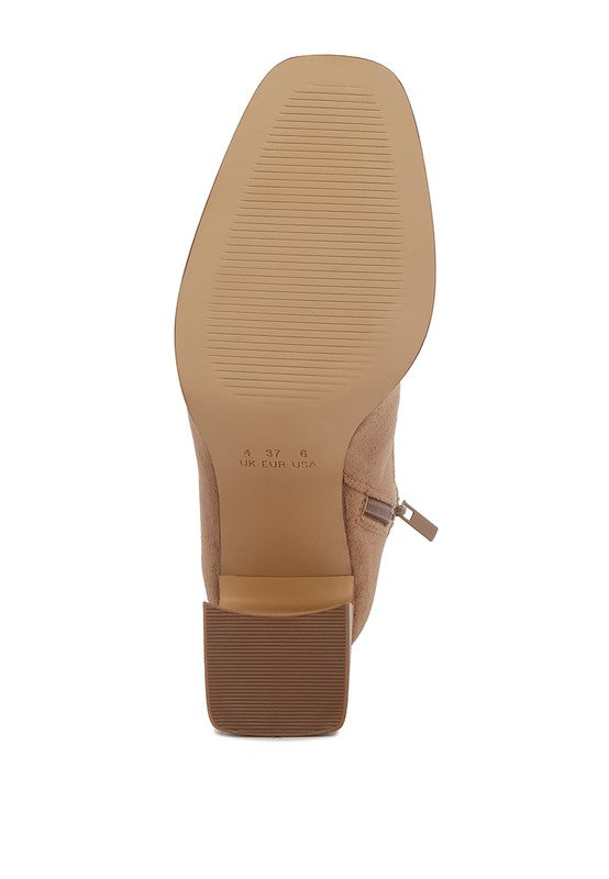 Sole view of Rag Company high ankle flared block heel boots in beige for a stylish, modern look