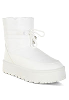 Rag Company white high ankle winter boots with padded design and lace-up detailing for cold weather