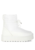 White women's high ankle winter boots featuring a sleek design and durable sole for comfort and style
