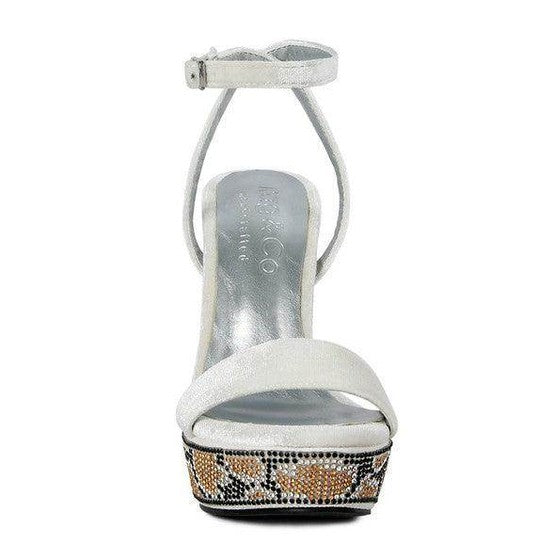Elegant white high heel vacation sandals with ankle strap and patterned platform from Rag Company
