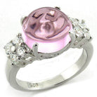 High polished 925 silver ring featuring a large pink gemstone and sparkling side stones for elegant style
