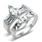 Stunning high polished silver engagement ring featuring a marquise diamond and emerald cut stones