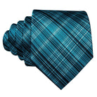 High quality teal tie with a modern plaid design for stylish men's accessories