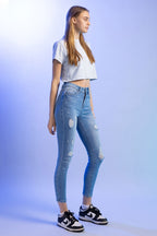 Women's high rise skinny jeans in light blue, perfect for casual outings