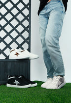 Women's high top star sneakers in black and white for casual wear