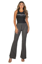 VacationGrabs high waist bell bottoms for women in black and white pattern styled with a black sleeveless top