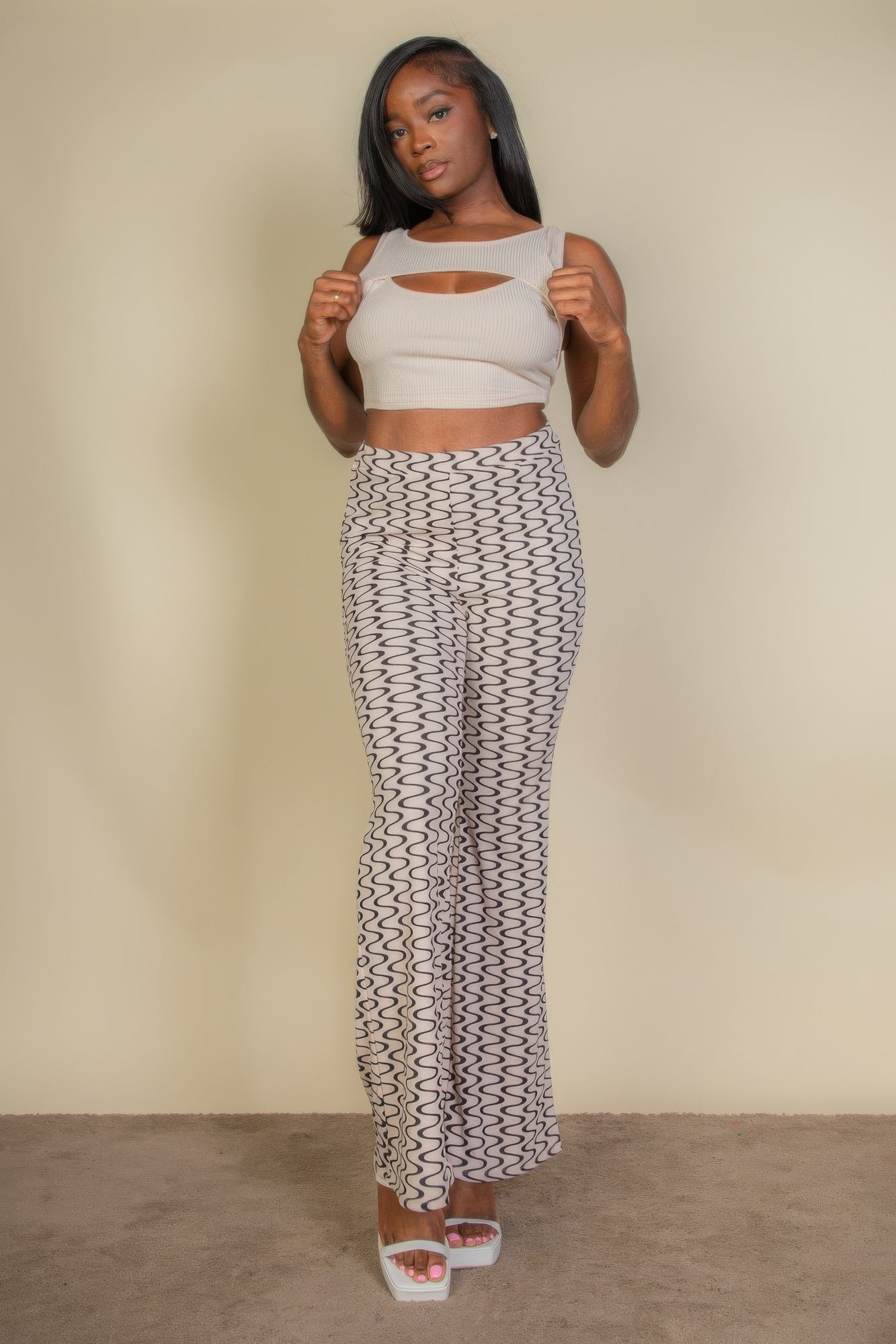 VacationGrabs high waist bell bottoms for women featuring a wavy pattern and a flattering fit