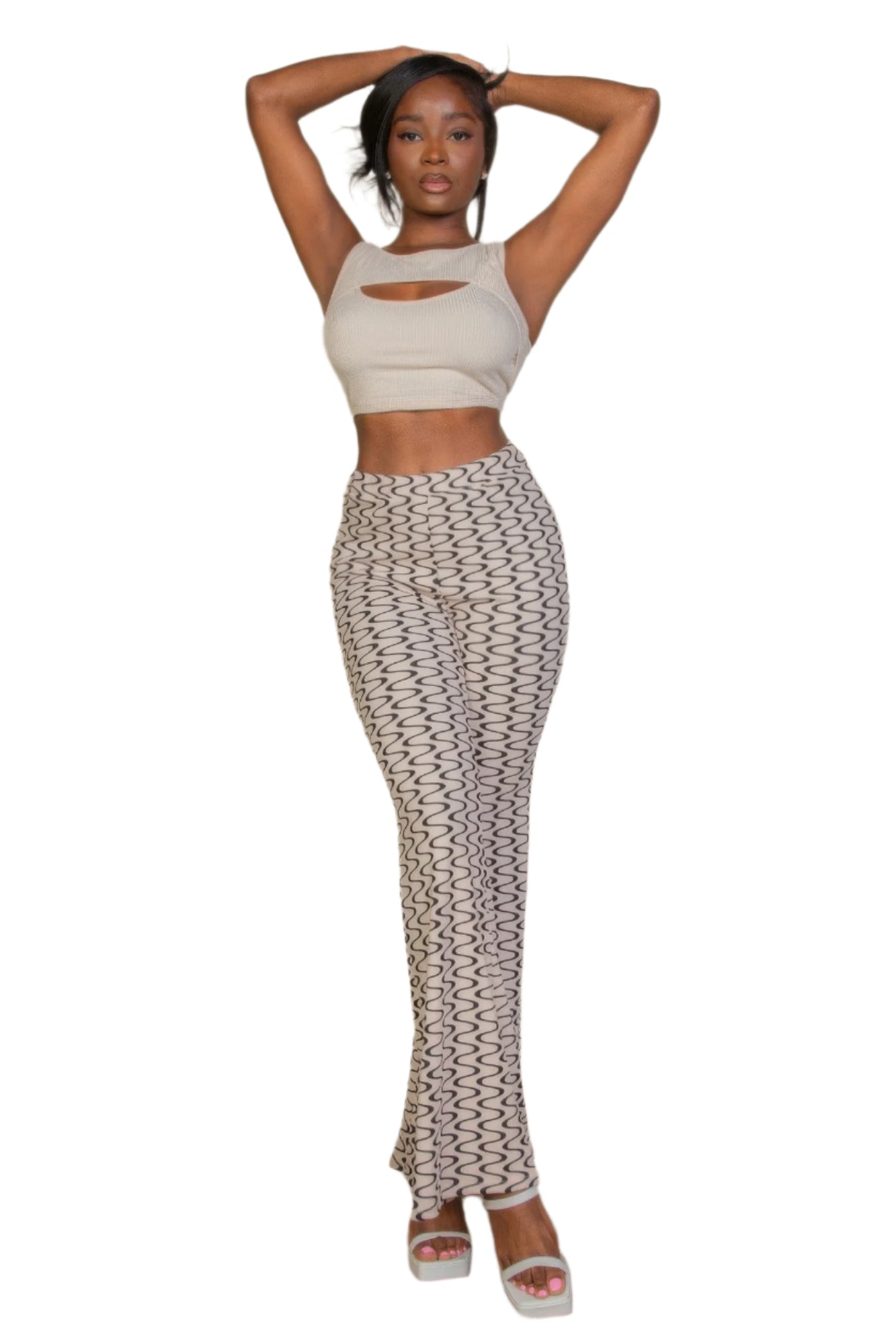 VacationGrabs high waist bell bottoms for women with wave pattern paired with white crop top and sandals