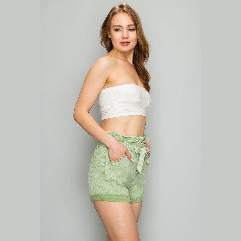 Women's high waist belted shorts in light green with pockets and a stylish tie belt