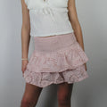 Women's pink high waist denim skort, perfect for summer outings