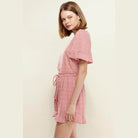 Pleione high waist summer shorts in pink with a drawstring waist and ruffled hem for a stylish look
