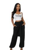 VacationGrabs women's high waisted stretch pants in black with a tie belt and relaxed fit