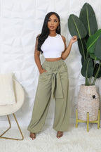 VacationGrabs women's high waisted stretch pants in olive green with a tied waist and wide legs