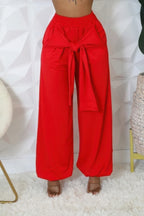 VacationGrabs women's high waisted stretch pants in vibrant red with a tied waist and wide leg design