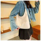 Cream women's retro tote bag, stylish for everyday use