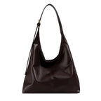 Women's retro tote bag in dark brown leather, ideal for everyday use.