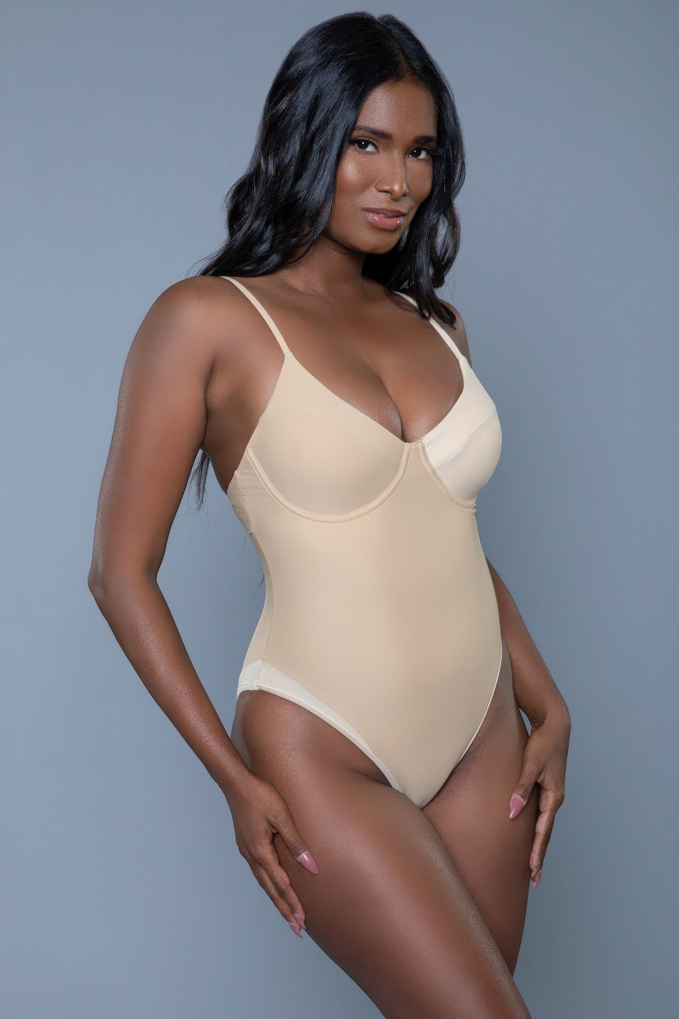 Women's nude one-piece swimsuit, perfect for beach vacations, hornet charlotte