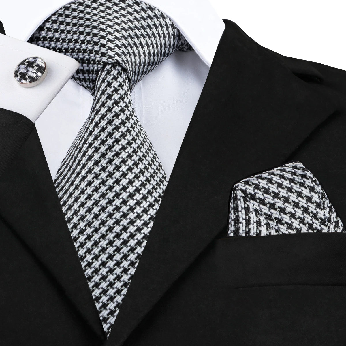 Black and white patterned men's tie for learning how to tie men's tie
