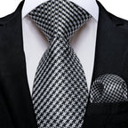 Men's black and silver knitted tie, perfect for formal occasions, how to tie men's tie