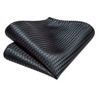 Black patterned tie perfect for learning how to tie men's tie