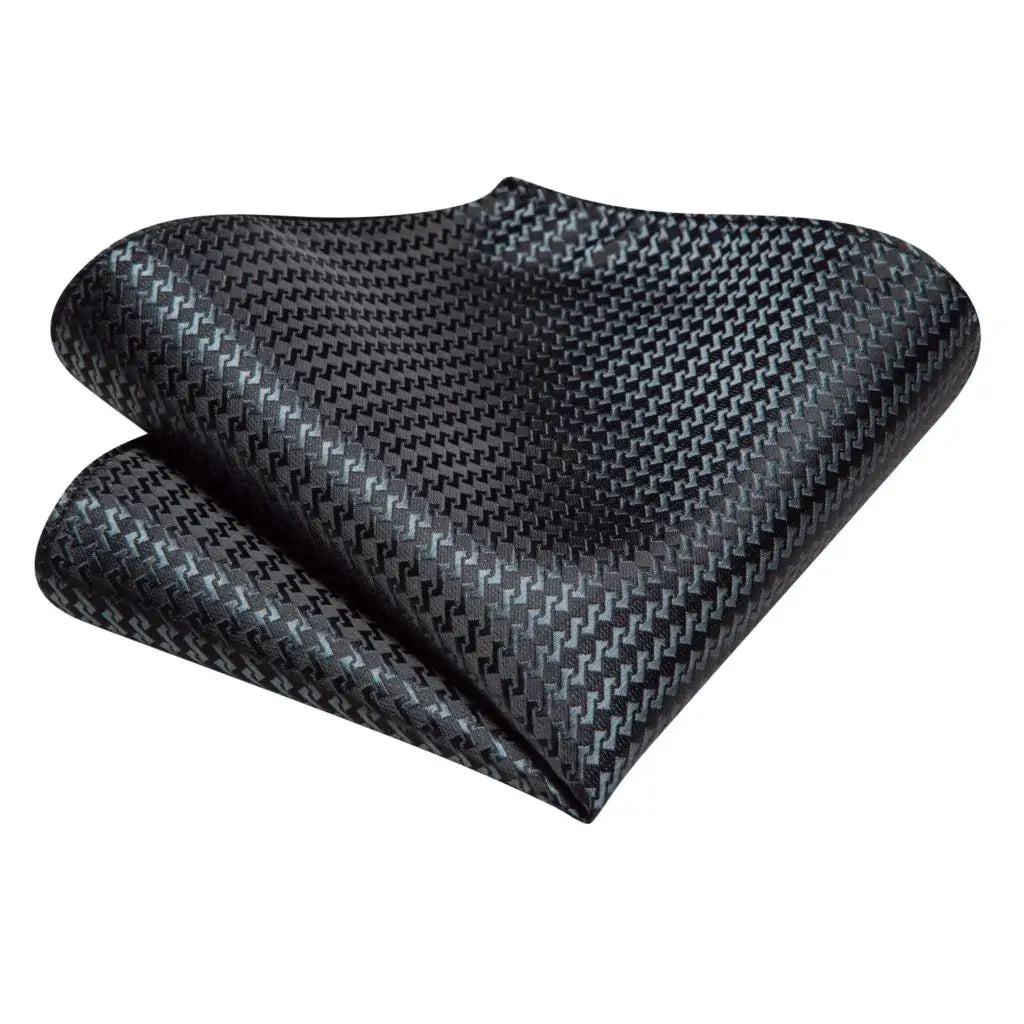Black patterned tie perfect for learning how to tie men's tie