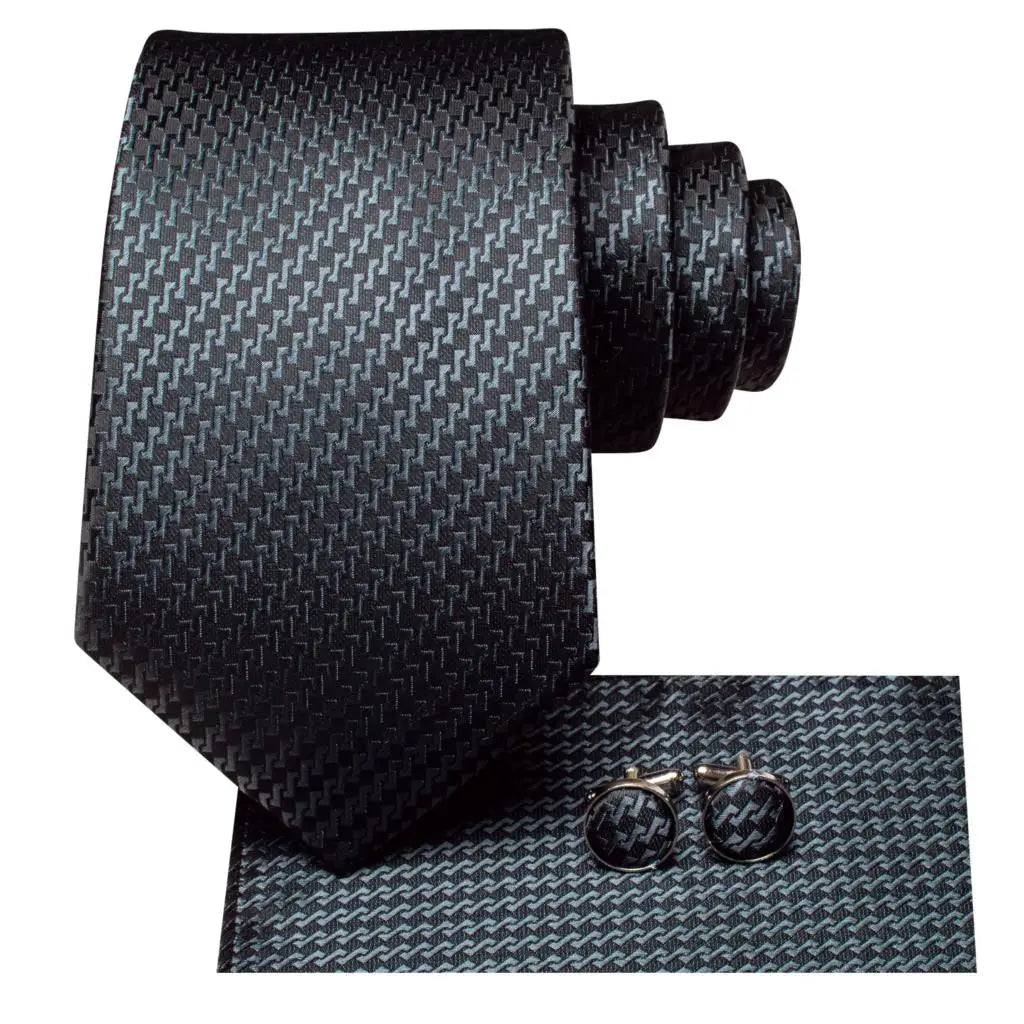 Black patterned men's tie set with cufflinks, perfect for formal occasions