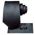 Black patterned men's tie set with cufflinks, perfect for formal occasions