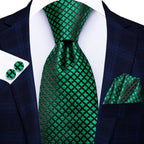 Green patterned men's tie perfect for formal occasions, teaching how to tie mens tie