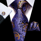 Men's purple paisley tie with matching pocket square, perfect for formal events