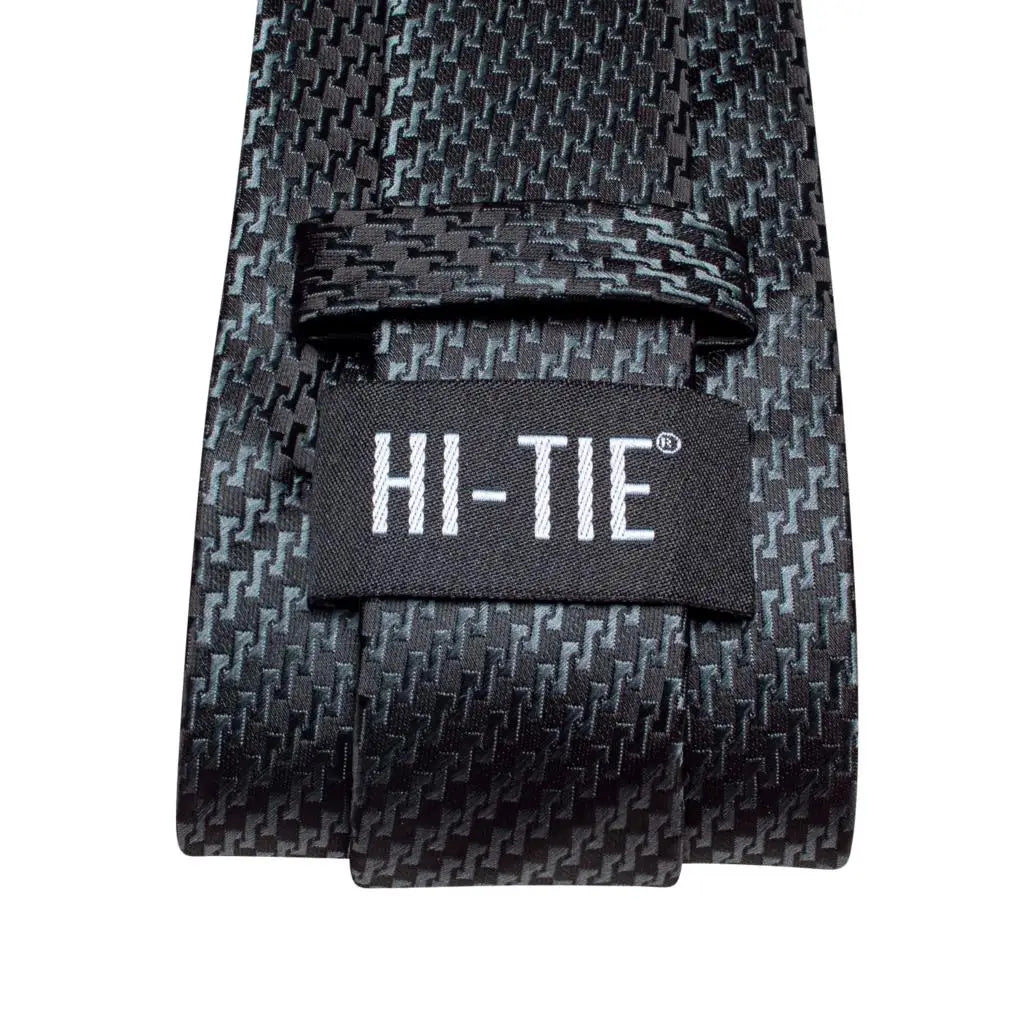 Black silk tie with adjustable loop for learning how to tie men's tie