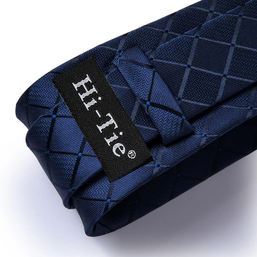 Navy blue men's tie with a textured pattern, perfect for formal occasions, how to tie men's tie