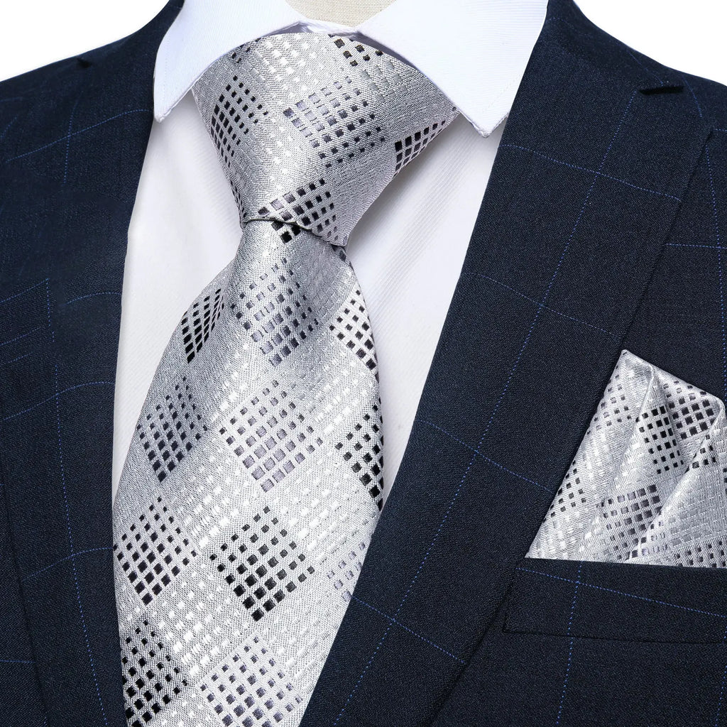 Silver patterned men's tie, perfect for learning how to tie men's tie.