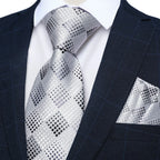 Silver patterned men's tie, perfect for learning how to tie men's tie.