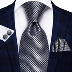 Silver men's tie with geometric pattern, perfect for learning how to tie men's tie
