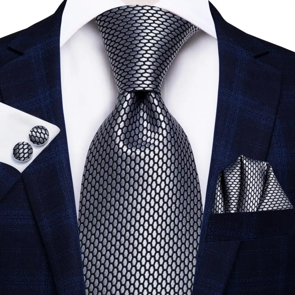 Men's silver patterned tie, perfect for formal occasions, learn how to tie men's tie