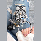 Stylish Aili's Corner ID holder keychain bracelet in snake print, ideal for easy access to keys and cards