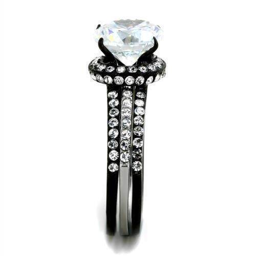 VacationGrabs ion plated black engagement ring with a sparkling diamond and ornate band