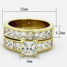 Ion plated gold wedding ring for women featuring multiple cubic zirconia stones and elegant design