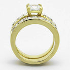 Elegant ion plated gold wedding ring for women featuring a sparkling center stone and adorned with clear crystals