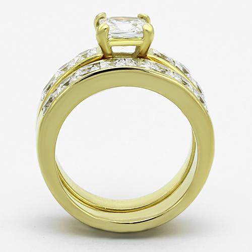 Elegant ion plated gold wedding ring for women featuring a sparkling center stone and adorned with clear crystals