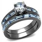Stunning IP gun color engagement ring with a sparkling center stone and blue accents for a modern look