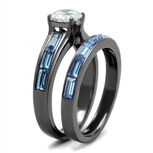 Stunning IP gun color engagement ring featuring a sparkling center stone and blue accent stones
