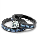 IP gun color engagement ring featuring a large center stone and blue accent stones on a sleek band