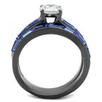 Stunning IP gun color engagement ring featuring a sparkling center stone and blue accent details